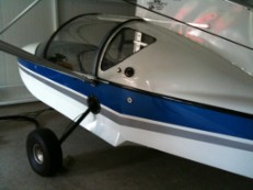 Small blue and white airplane.